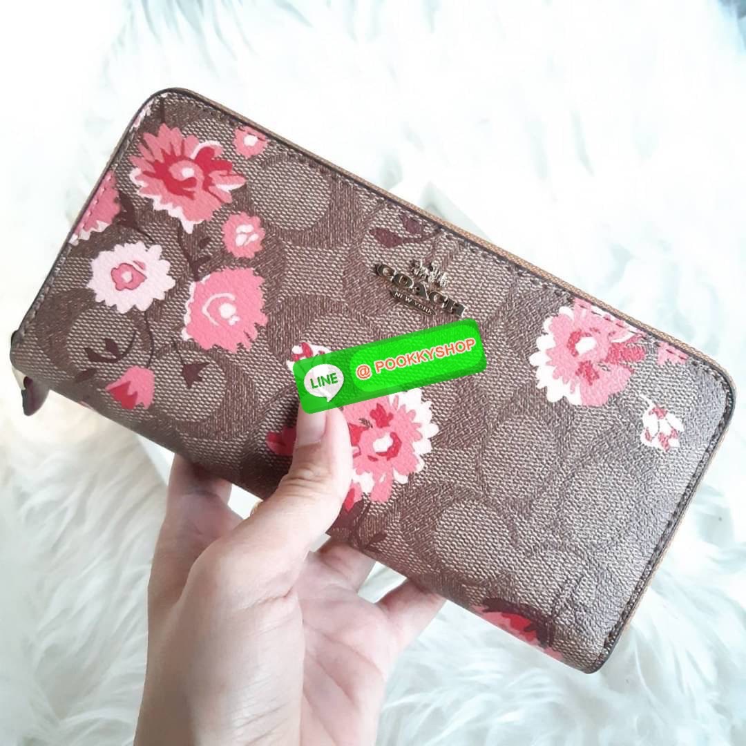 COACH F78018 ACCORDION ZIP WALLET IN SIGNATURE CANVAS WITH PRAIRIE DAISY CLUSTER PRINT ฮอตไม่เลิก!! กระเป๋าสตางค์ใบยาว ลวดลายดอกไม้ ขายดีที่สุด!! วัสดุหนังแคนวาสเคลือบลาย เปิด-ปิดด้วยซิปรอบ รูดใช้งานง่าย ใส่มือถือได้ ใส่บัตร ใส่ธนบัตรได้สบายๆ สวยเกินราคาแ