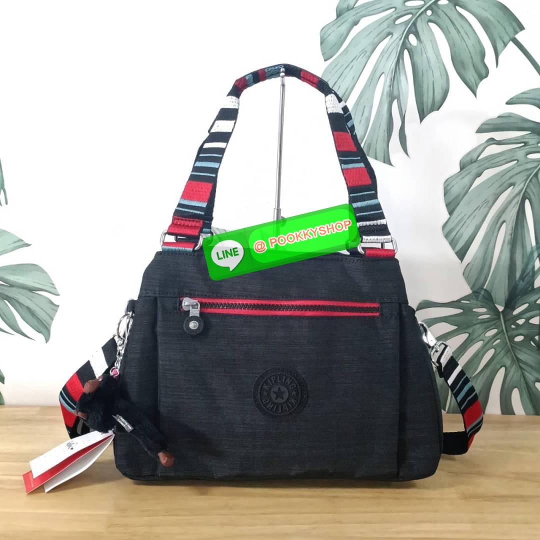 KIPLING ELISE HANDBAG กระเป๋าถือและสะพายไหล่ วัสดุ Nylon +Polyester ขนาดกำลังพอดี จุของได้มาก มีหูจับสองสาย ถือสะดวก น้ำหนักเบา มีช่องซิป ด้านหน้า ช่อง กระเป๋าหลักเปิด-ปิดด้วยซิป มี3 ช่องว่างใส่ของได้จุมากๆ ใส่มือถือได้ กระเป๋าสตางค์ใบยาว และ เครื่องสำอาง