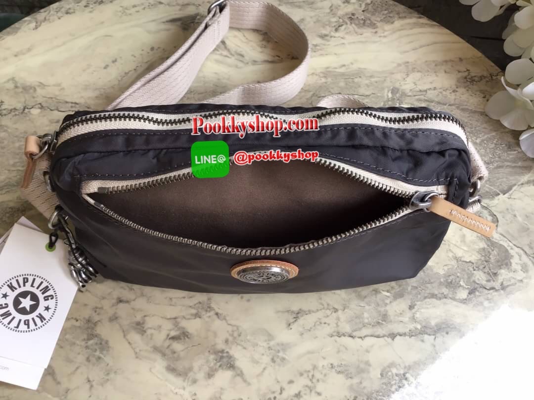 Kipling Yoku Medium Crossbody bag convertible to waistbag กระเป๋าคาดอกและสะพายข้าง คอลเลคชั่นใหม่ล่าสุดจาก Part of the Edgeland Plus วัสดุ100% polyester วัสดุกันน้ำ สีสันสไตล์วินเทจ ดูเป็นเอกลักษณ์ น้ำหนักเบา สะพายแล้วคล่องตัว ภายในกว้าง ใส่กระเป๋าเงินใบย