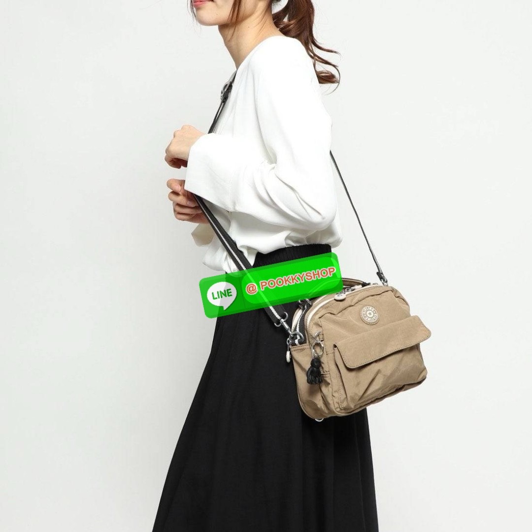 KIPLING Cand 2 ways backpack กระเป๋าถือหรือสะพายข้าง ขนาดกลาง วัสดุ Polyester 100% -ด้านหน้ามี 2 ช่องซิป -ช่องหลักโล่งกว้าง ใส่ของได้เยอะสุดๆ พร้อมช่องซิปและช่องแยกด้านข้างให้แยกของได้เป็นระเบียบมากขึ้น สามารถติใส่กระเป๋าสตางค์ใบยาวได้ มาพร้อมสายคล้องพวงก