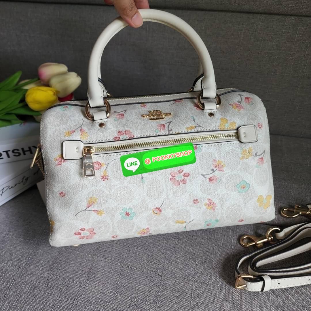 COACH ROWAN SATCHEL IN SIGNATURE CANVAS WITH MYSTICAL FLORAL PRINT (COACH C8615) กระเป๋าสะพายข้างทรงหมอนเป็นอีกรุ่นมาแรงสุดๆ ฮอตตลอด เป็นทรงที่ต้องมาติดตู้ โดดเด่นอย่างลงตัวกับรุ่นนี้ หมอน 10" รุ่นมีช่องซิปด้านหน้า สามารถแยกเก็บของสำคัญๆได้อย่างเป็นส