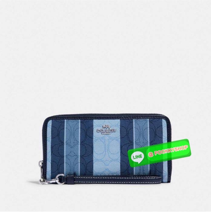 COACH C8313 LONG ZIP AROUND WALLET WITH SIGNATURE JACQUARD WITH STRIPES พร้อมเสิร์ฟความเลิศหรู ใหม่ล่าสุด กระเป๋าสตางค์ใบยาวกึ่งคล้องมือ ดีไซน์ผู้ดี๊ผู้ดี รุ่นขายดี ถือใช้คือขับผิวสุด!! วัสดุผ้า jacquard ลวดลายดูแพง มาพร้อมสายคล้องมือ ถอดออกได้ ภายในใส่บั