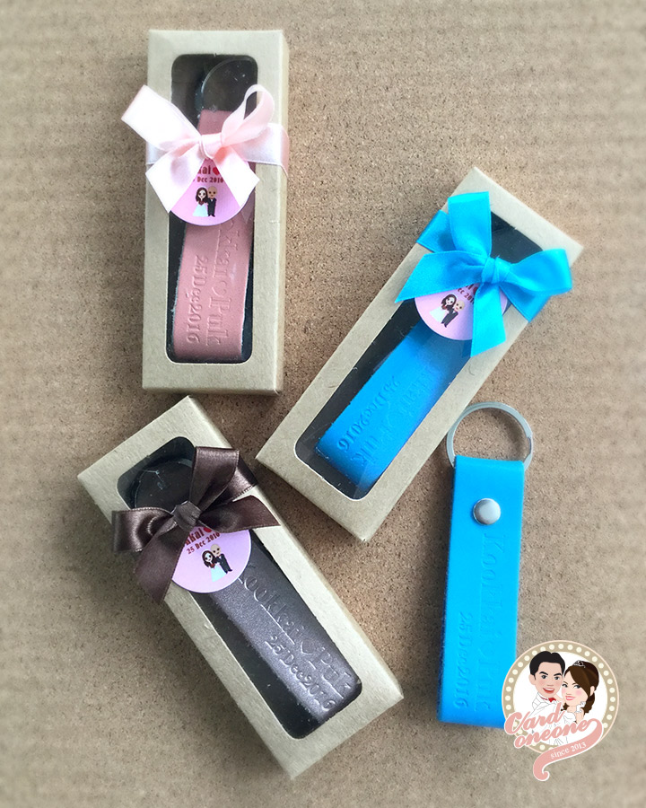 ของชำร่วยพวงกุญแจหนังปั๊ม thank you
