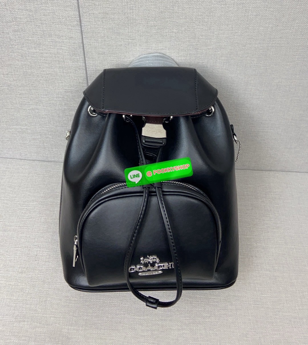 COACH PACE BACKPACK COACH CR100 | Refined calf leather | Inside zip and multifunction pockets | Drawstring and speedclip closures, fabric lining | Handle with 3" drop | Outside zip pocket | Outside zip access to interior |