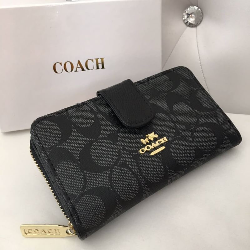 กระเป๋าสตางค์ รุ่นขายดี กระเป๋าสตางค์ Coach สองพับ งานเกรดพรีเมี่ยมปั้มทุกจุด ติดโลโก้ปั้ม Coach ด้านใน 1 ช่องใส่เเบงค์ ใส่บัตร 1 ซิป ภายในมี 2 ช่อง งานสวย เนี๊ยบสุด อุปกรณ์ กล่องเเบรนด์