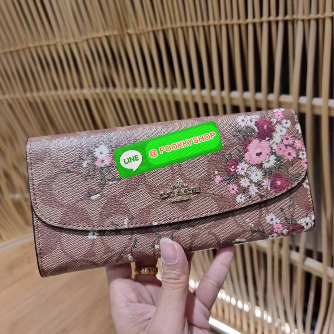COACH F29395 SLIM ENVELOPE WALLET IN SIGNATURE CANVAS WITH FLORAL BUNDLE PRINT กระเป๋าสตางค์รุ่นขายดี ทรงจดหมายรุ่นฝาพับ ดีไซน์ลายช่อดอกไม้ น่ารักสดใส วัสดุหนังแคนวาสเคลือบลาย ภายในใส่มือถือได้ ใส่บัตรได้ มีช่องซิปแยกแบ่งเป็นสัดส่วน ใบจริงคือดีงาม สาวๆใช้