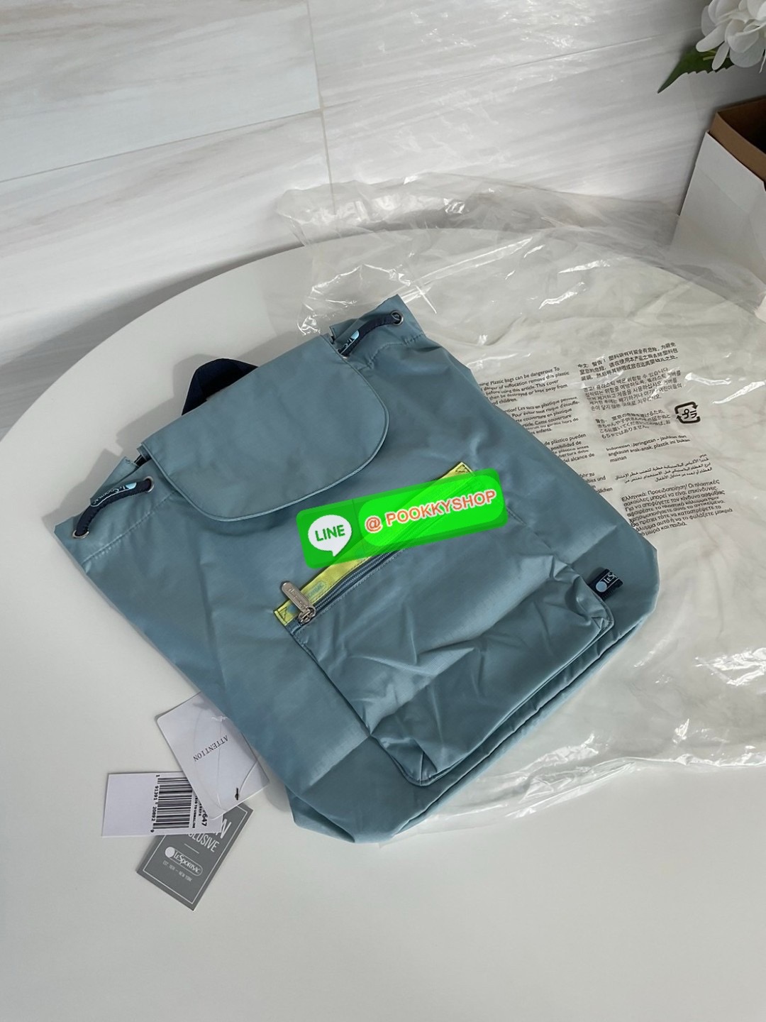 🚚 พร้อมส่ง 🚚 Japan LeSportsac Casual Versatile Portable Women's Bag Solid Color Blue Bucket Bag Flip Backpack สินค้าแบรนด์แท้100% พร้อมแท็ก! กระเป๋าเป้สะพายหลังลําลอง ทรงบักเก็ต น้ําหนักเบา กระเป๋าเป้หูรูด กระเป๋าเดินทางขนาดกลาง ด้านห
