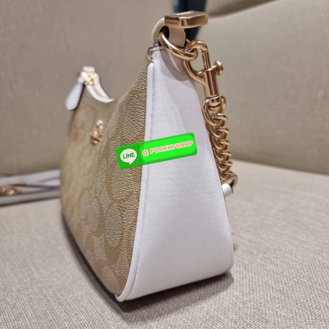 COACH CA548 TERI SHOULDER BAG IN SIGNATURE CANVAS คอลเลคชั่นใหม่ล่าสุด ที่สาวๆรอคอย กระเป๋าสะพายไหล่กึ่งทรงพอช พร้อมเสิร์ฟความสวยถึงบ้านไปเลยก่อนใคร แบบไม่ต้องพรีฯ ด้วยดีไซน์คลาสสิคที่แอบแฝงความเรียบหรู มาพร้อมสายสะพาย 2 เส้น เป็นสายโซ่คล้องแขนและสายสะพาย