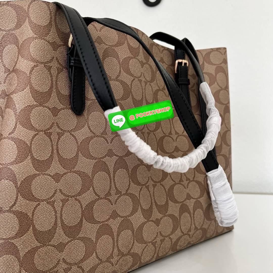Coach MOLLIE TOTE IN SIGNATURE CANVAS (COACH 1665) กระเป๋าหนังใบเคลือบซิกเนเจอร์และหนังเรียบ ภายในกระเป๋ามัลติฟังก์ชั่น ปิดด้วยซิป ซับในผ้า หูหิ้วพร้อมหูหิ้ว 10 1/4" ช่องเปิดด้านข้าง