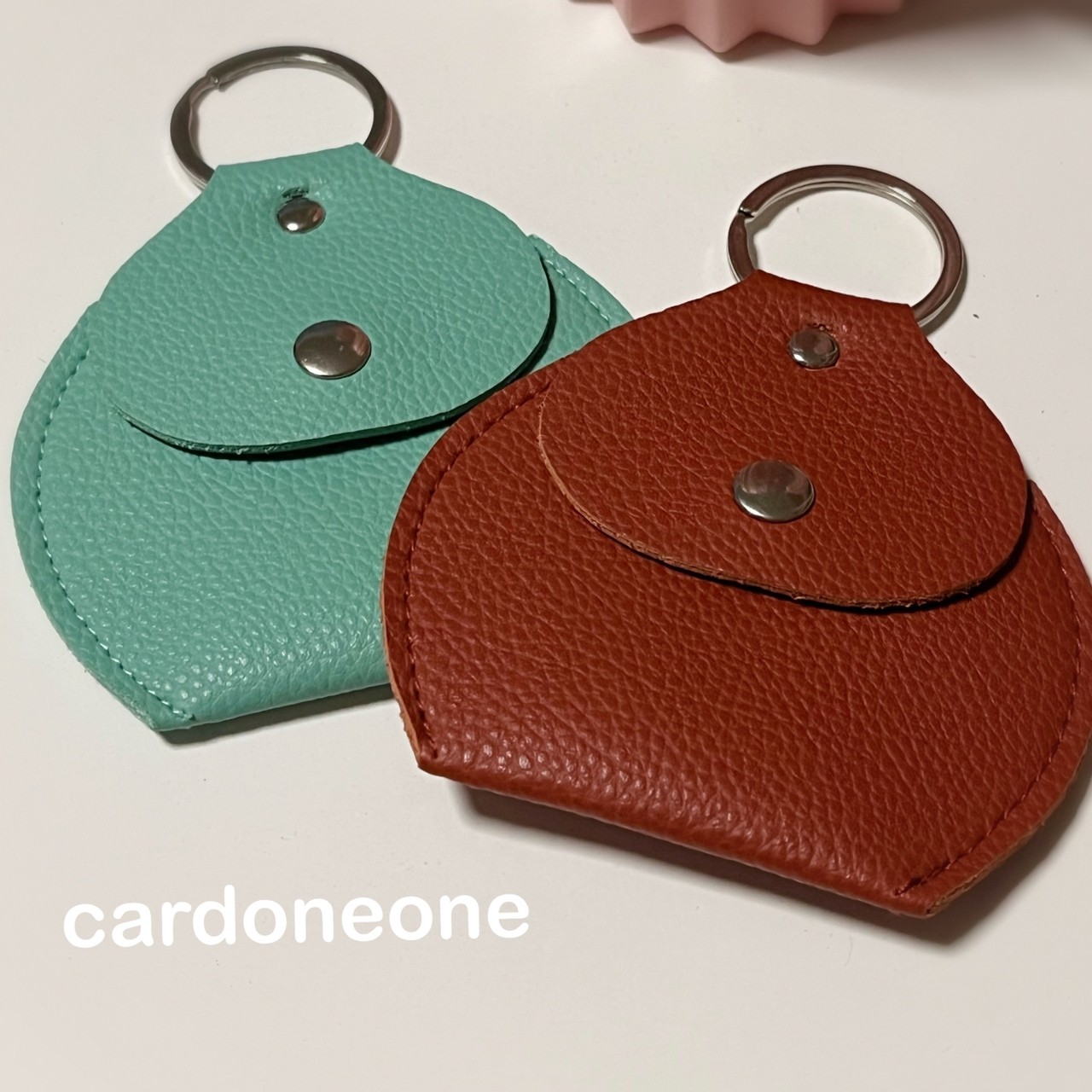 พวงกุณแจกระเป๋าหนังทรงลูกแพร