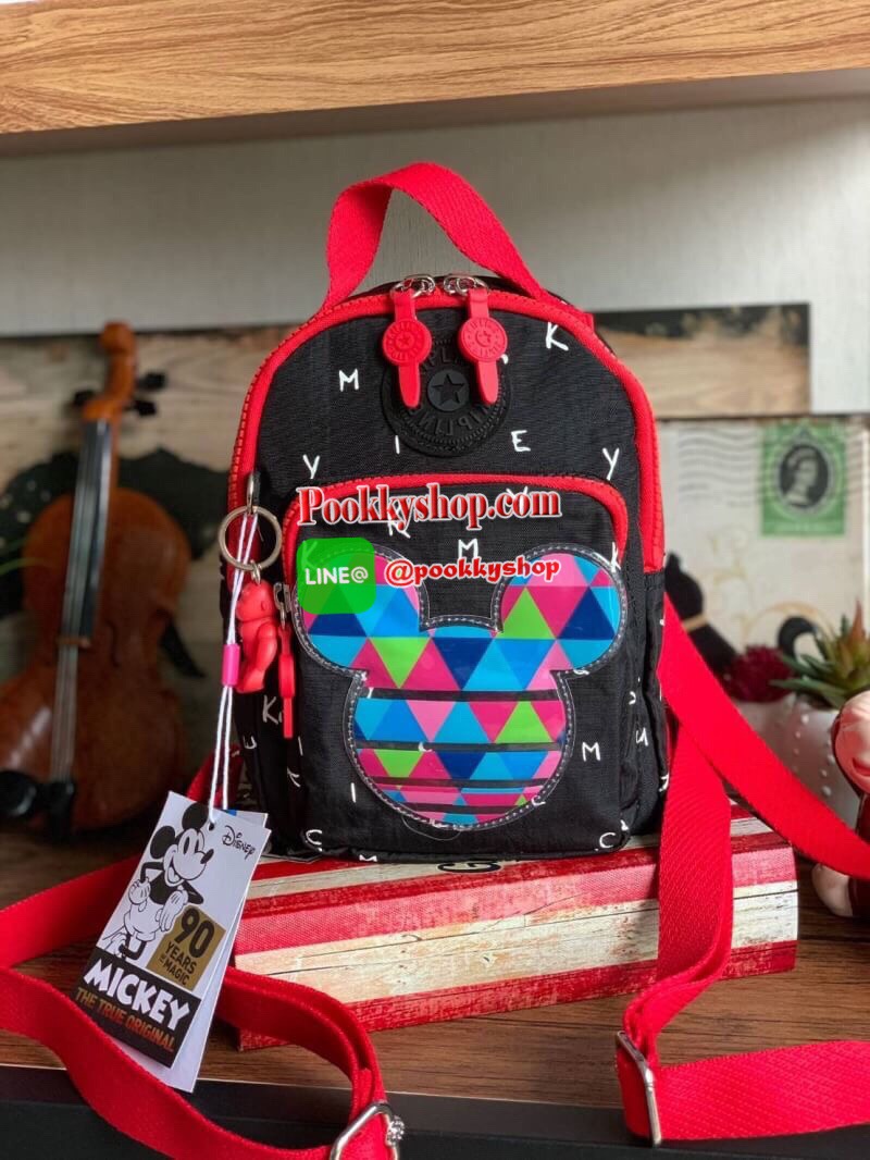 Kipling BRight Disney's Minnie Mouse And Mickey Mouse รุ่น Mini Backpack เป็นได้ทั้งทรงcrossbody และmini Backpack พร้อมสายสะพาย2เส้น ปรับฟรีไซส์ได้ สามารถน้ำหนักเบา วัสดุ100% Polyamide ดีเทลน่ารักๆจากบรรดามิคกี้และมินนี่ที่มาวาดลวดลายลงบนกระเป๋าให้ดู