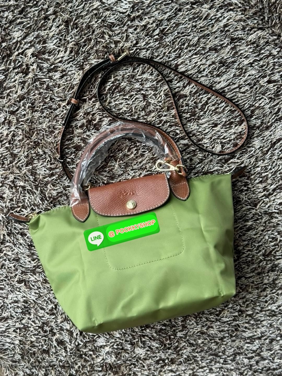 LONGCHAMP LE PLIAGE ORIGINAL S HANDBAG Crossbody Bag กระเป๋าสะพายไหล่ รุ่น Original มีเอกลักษณ์อันโดดเด่นของรุ่นไอคอนนิคของ Longchamp อย่าง Le Pliage (เลอ ปลิยาจ) โดย Longchamp ได้รับแรงบันดาลใจจากศิลปะการพับกระดาษแบบ Origami (โอริกามิ) ในการสรรค์สร้างกระ