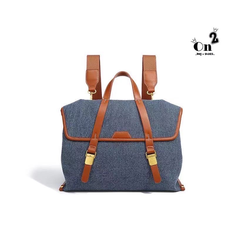 Songmont backpack วัสดุตัวกระเป๋าทำจากผ้าdenim อย่างดี ตรงสายทำจากหนังแท้ real leather อะหลั่ยสีทอง ของจริงน่ารักมากๆ มาพร้อมสายยาว 2 เส้น ทำจากผ้าไนล่อนอย่างหนา