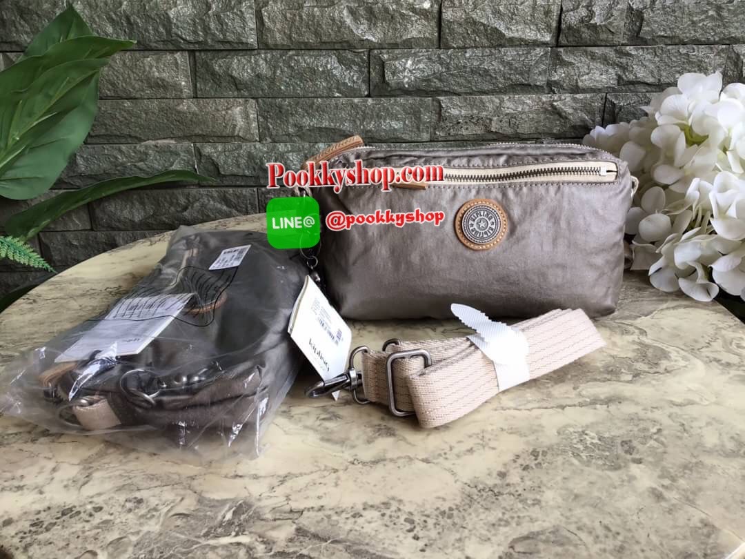 Kipling Yoku Medium Crossbody bag convertible to waistbag กระเป๋าคาดอกและสะพายข้าง คอลเลคชั่นใหม่ล่าสุดจาก Part of the Edgeland Plus วัสดุ100% polyester วัสดุกันน้ำ สีสันสไตล์วินเทจ ดูเป็นเอกลักษณ์ น้ำหนักเบา สะพายแล้วคล่องตัว ภายในกว้าง ใส่กระเป๋าเงินใบย
