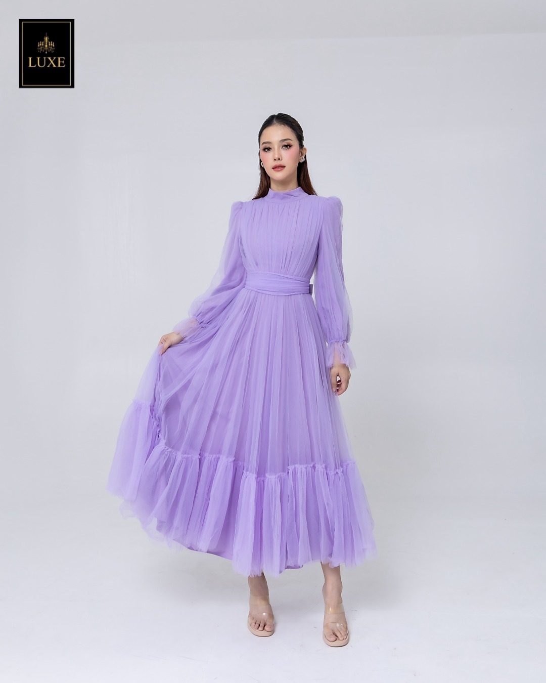 เดรสแฟชั่น แม็กซี่เดรสเสื้อคอปีนแขนยาว กระโปรงบานต่อชายรูดระบายรอบตัว มีโบว์ผูกเอว