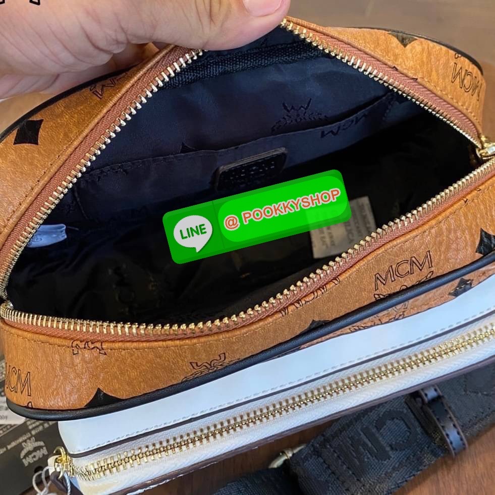 MCM Klassik Crossbody in Visetos Mix The small Klassik crossbody bag gains a color block monogram aesthetic this season.