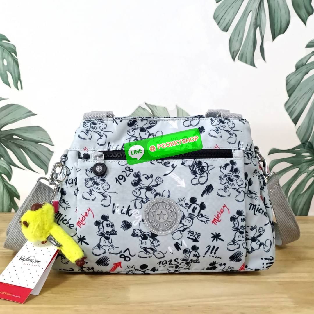 KIPLING ELISE HANDBAG กระเป๋าถือและสะพายไหล่ วัสดุ Nylon +Polyester ขนาดกำลังพอดี จุของได้มาก มีหูจับสองสาย ถือสะดวก น้ำหนักเบา มีช่องซิป ด้านหน้า ช่อง กระเป๋าหลักเปิด-ปิดด้วยซิป มี3 ช่องว่างใส่ของได้จุมากๆ ใส่มือถือได้ กระเป๋าสตางค์ใบยาว และ เครื่องสำอาง