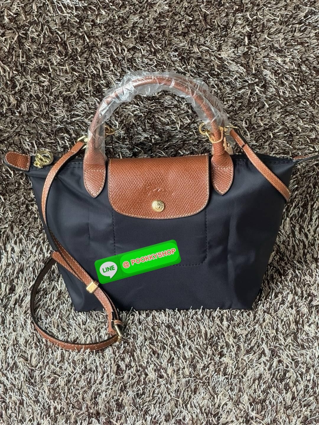LONGCHAMP LE PLIAGE ORIGINAL S HANDBAG Crossbody Bag กระเป๋าสะพายไหล่ รุ่น Original มีเอกลักษณ์อันโดดเด่นของรุ่นไอคอนนิคของ Longchamp อย่าง Le Pliage (เลอ ปลิยาจ) โดย Longchamp ได้รับแรงบันดาลใจจากศิลปะการพับกระดาษแบบ Origami (โอริกามิ) ในการสรรค์สร้างกระ
