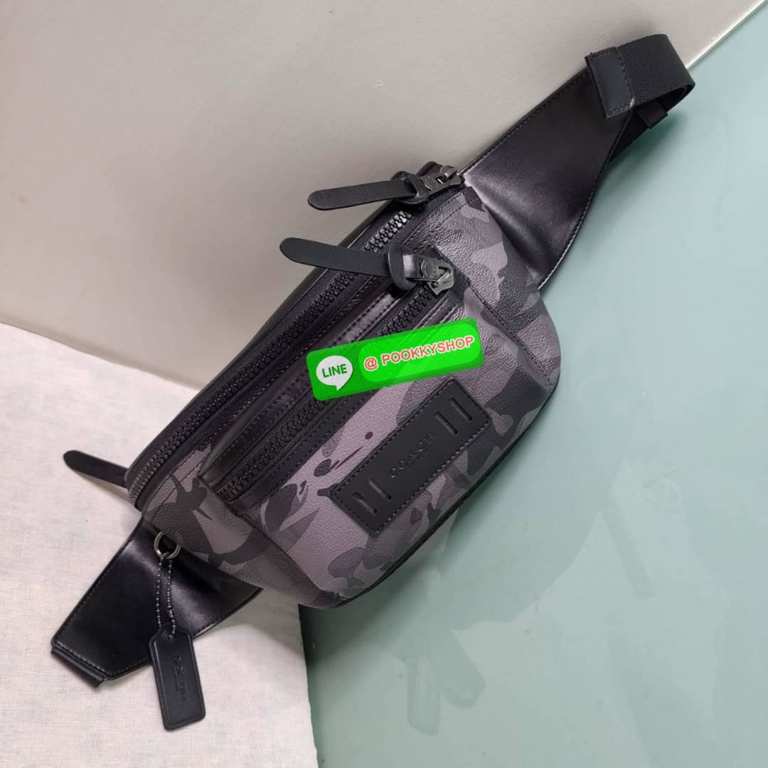 กระเป๋า คาดอก/คาดเอว COACH TERRAIN BELT BAG IN SIGNATURE CANVAS WITH CAMO PRINT (COACH F89034) เป๋าคาดเข็มขัด ผ้าใบเคลือบซิกเนเจอร์และหนังลูกวัวอย่างดี ภายในกระเป๋ามัลติฟังก์ชั่น ปิดด้วยซิป ซับในผ้า กระเป๋าซิปด้านนอก สายปรับได้สำหรับสวมใส่ที่เอว