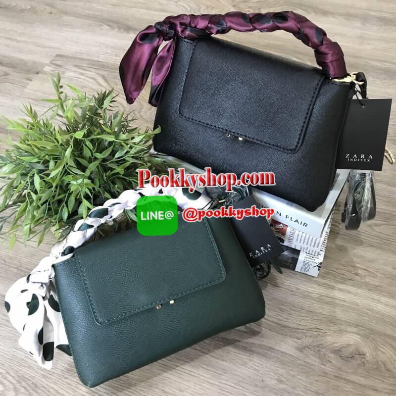 พร้อมส่งความน่ารัก..รุ่นใหม่ชนช็อป! NEW! ZARA MINI CITY BAG With POLKA DOTS SCARF กระเป๋าถือหรือสะพายรุ่นใหม่ชนช็อปวัสดุหนัง Saffiano อยู่ทรงสวยสไตล์ PRADA โดดเด่นที่มาพร้อม Scarf ลาย Polka dots พันหูหิ้วเป็นเปียสุดชิค หูหิ้วจับถนัดมือ เปิดปิดด้วยตัวล๊อค