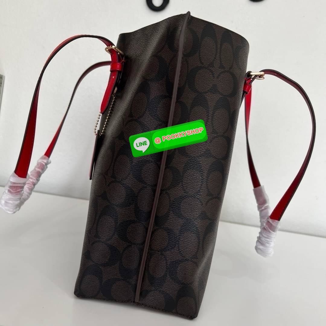 Coach MOLLIE TOTE IN SIGNATURE CANVAS (COACH 1665) กระเป๋าหนังใบเคลือบซิกเนเจอร์และหนังเรียบ ภายในกระเป๋ามัลติฟังก์ชั่น ปิดด้วยซิป ซับในผ้า หูหิ้วพร้อมหูหิ้ว 10 1/4" ช่องเปิดด้านข้าง