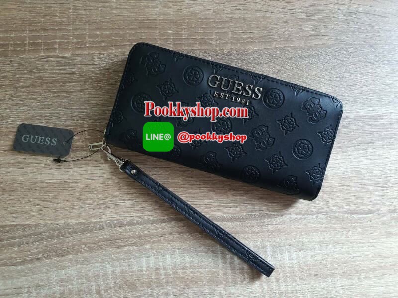 NEW ARRIVAL! GUESS WOMEN'S 2019 LONG WALLET กระเป๋าสตางค์ใบยาวหนังแต่งลายสุดหรู ด้านหน้าประดับโลโก้แบรนด์ เปิดปิดด้วยซิปมาพร้อมสายคล้องมือถอดแยกได้ ด้านหลังมีช่องซิป หัวซิปปั๊มแบรนด์ทุกจุด ภายในมีถึง 4 ช่อง มีช่องใส่ธนบัตรหลายช่อง ช่องซิปกลางและช่องใ