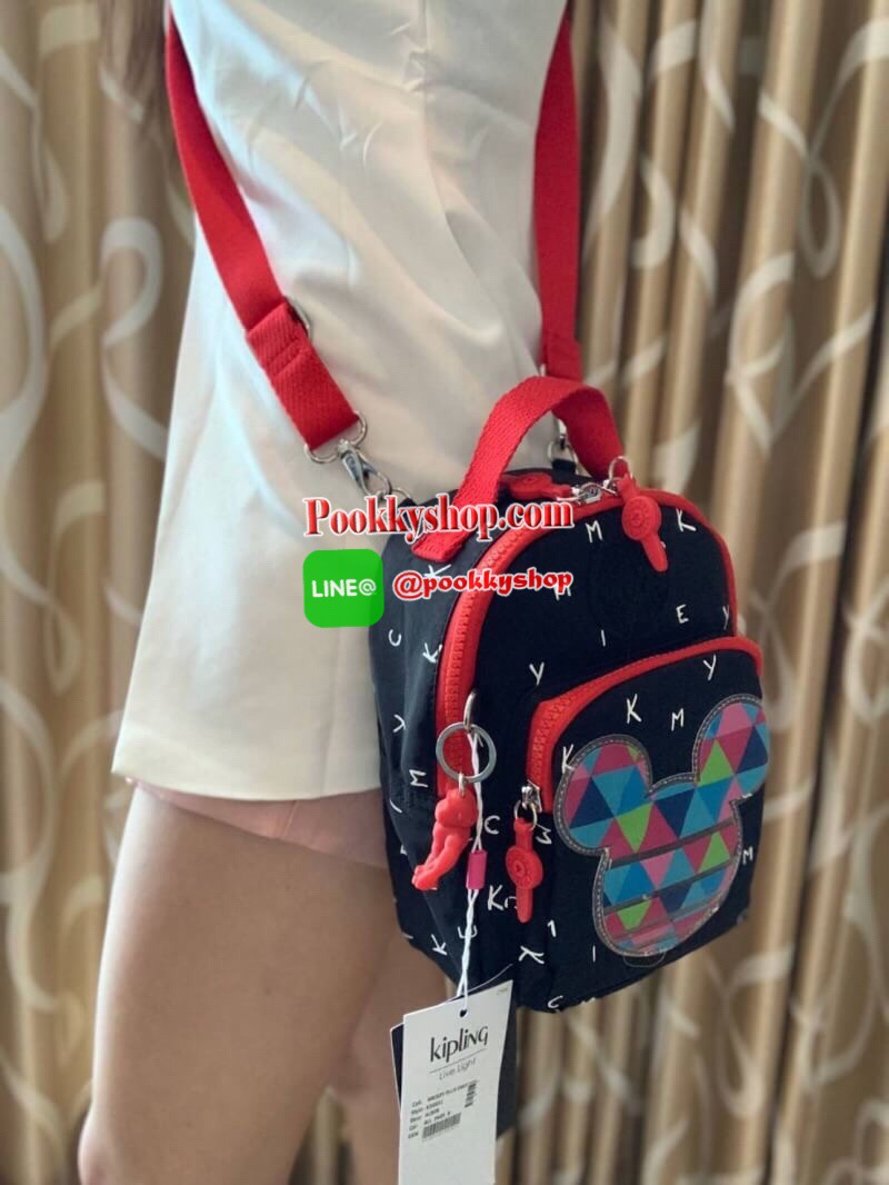 Kipling BRight Disney's Minnie Mouse And Mickey Mouse รุ่น Mini Backpack เป็นได้ทั้งทรงcrossbody และmini Backpack พร้อมสายสะพาย2เส้น ปรับฟรีไซส์ได้ สามารถน้ำหนักเบา วัสดุ100% Polyamide ดีเทลน่ารักๆจากบรรดามิคกี้และมินนี่ที่มาวาดลวดลายลงบนกระเป๋าให้ดู