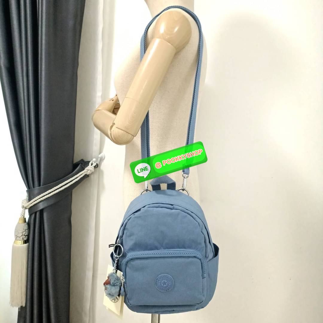 KIPLING Basic Mini Backpack กระเป๋าเป้ใบเล็กกระทัดรัด ขนาดมินิ วัสดุ Nylon + ซับใน Polyester มีหูหิ้ว สามารถสะพายข้าง หรือ สะพายหลังได้ -ช่องซิปหน้า -ด้านข้างมีช่องของเล็กน้อย หรือ ใส่ขวดน้ำใบเล็กทั้ง 2 ด้าน -ซิปหลัก โล่งกว้าง มีสายคล้องพวงกุญแจ พร้อมช่อง