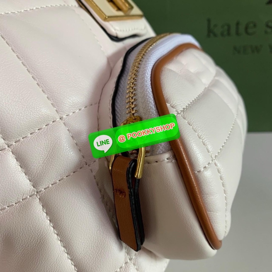 KATE SPADE NEW YORK Evelyn Small Quilted Leather Backpack กระเป๋าเป้สะพายหลังไซต์เล็กสุดคิ้ว หนังนิ่มสุดๆเย็บลวดลายตารางทั้งใบ ด้านหน้าตกแต่งต้วยชื่อแบรนด์ มีช่องเล็ก 1 ช่อง เปิด-ปิดกระเป๋าด้วยตัวล็อค ด้านในตัวกระเป๋าโล่งกว้าง จุของได้เยอะ และมีช่องซิปใส่