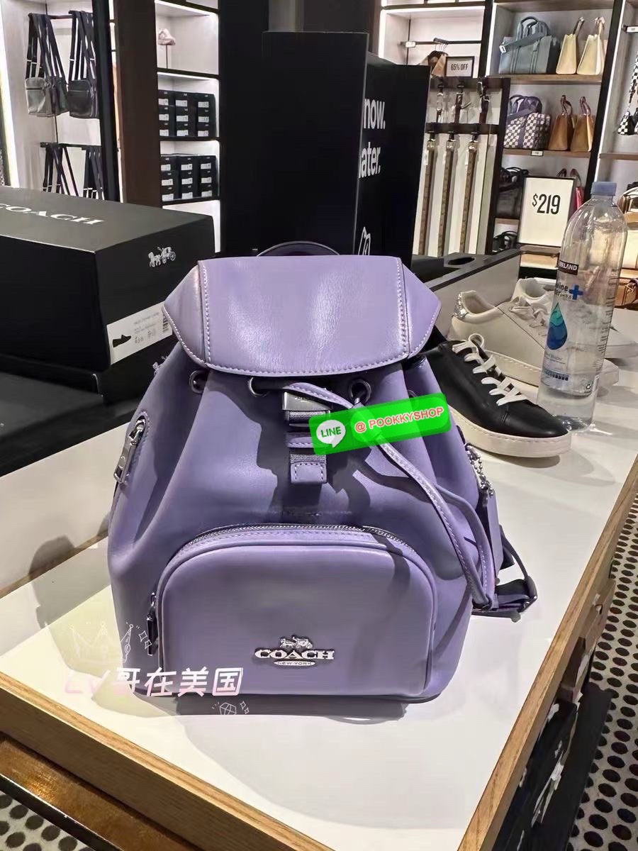 COACH PACE BACKPACK COACH CR100 | Refined calf leather | Inside zip and multifunction pockets | Drawstring and speedclip closures, fabric lining | Handle with 3" drop | Outside zip pocket | Outside zip access to interior |