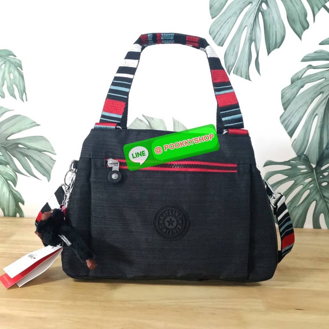 KIPLING ELISE HANDBAG กระเป๋าถือและสะพายไหล่ วัสดุ Nylon +Polyester ขนาดกำลังพอดี จุของได้มาก มีหูจับสองสาย ถือสะดวก น้ำหนักเบา มีช่องซิป ด้านหน้า ช่อง กระเป๋าหลักเปิด-ปิดด้วยซิป มี3 ช่องว่างใส่ของได้จุมากๆ ใส่มือถือได้ กระเป๋าสตางค์ใบยาว และ เครื่องสำอาง