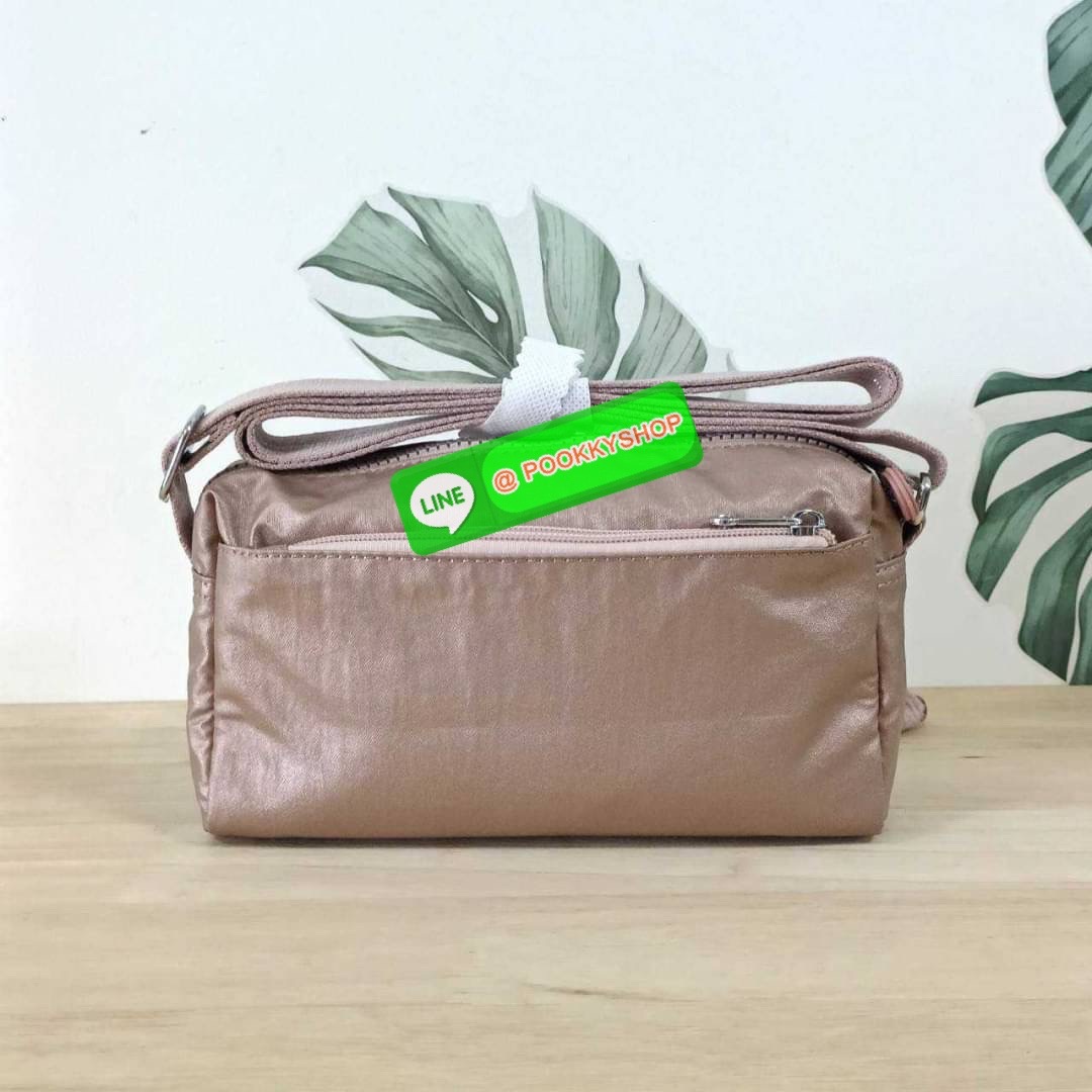 KIPLING Monkey program K16217 Seoul up sling bag รุ่น 3 ซิป สะพายข้าง ขนาดเล็กทรงสี่เหลี่ยมผืนผ้า วัสดุ Nylon 100% หลากหลายฟังก์ชั่นใช้งาน ครบครันในใบเดียว