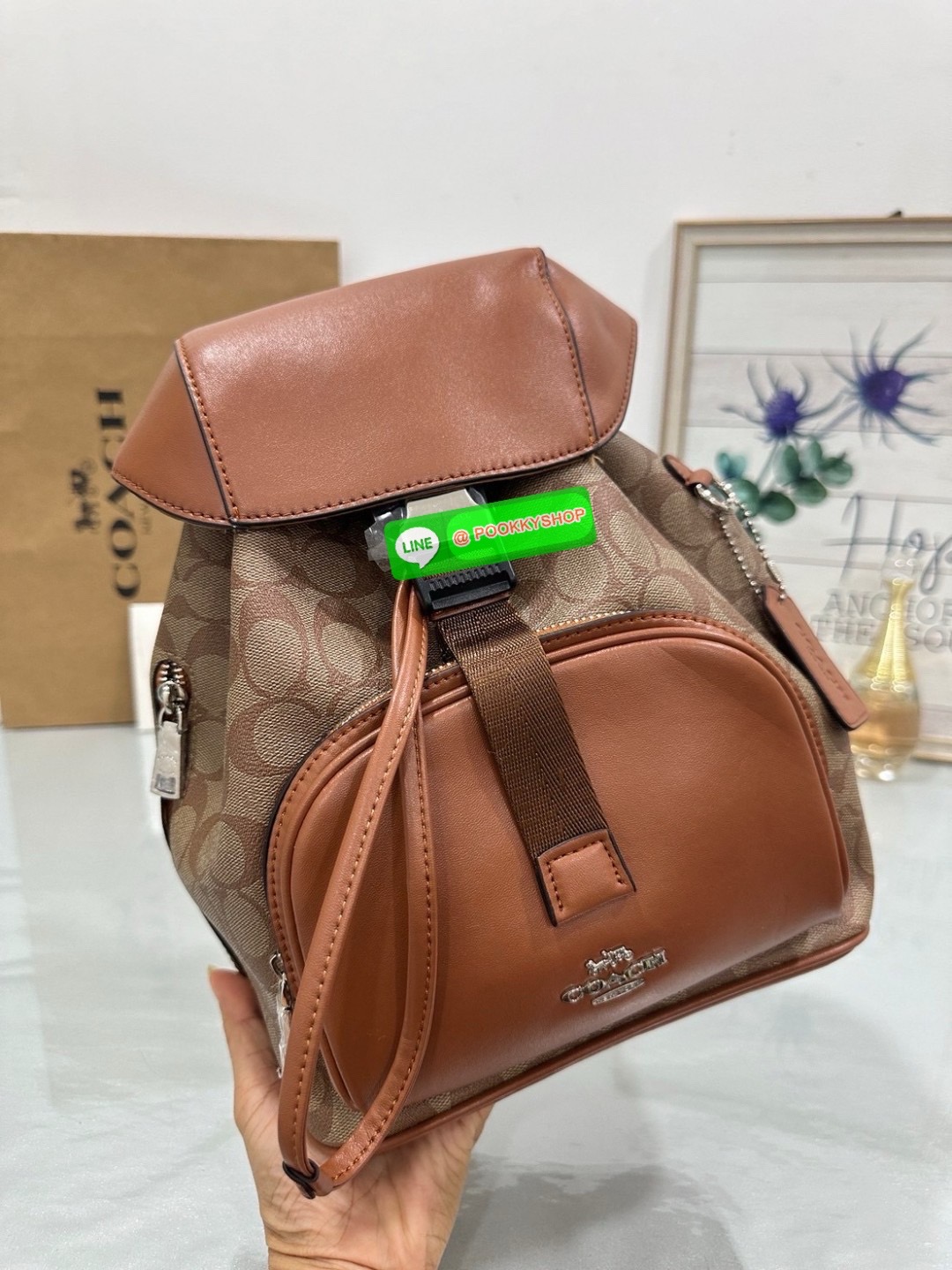 COACH PACE BACKPACK COACH CR100 | Refined calf leather | Inside zip and multifunction pockets | Drawstring and speedclip closures, fabric lining | Handle with 3" drop | Outside zip pocket | Outside zip access to interior |
