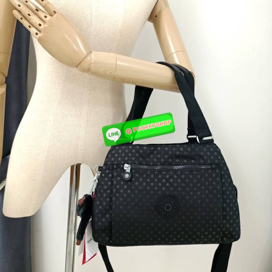 KIPLING ELISE HANDBAG กระเป๋าถือและสะพายไหล่ วัสดุ Nylon +Polyester ขนาดกำลังพอดี จุของได้มาก มีหูจับสองสาย ถือสะดวก น้ำหนักเบา มีช่องซิป ด้านหน้า ช่อง กระเป๋าหลักเปิด-ปิดด้วยซิป มี3 ช่องว่างใส่ของได้จุมากๆ ใส่มือถือได้ กระเป๋าสตางค์ใบยาว และ เครื่องสำอาง