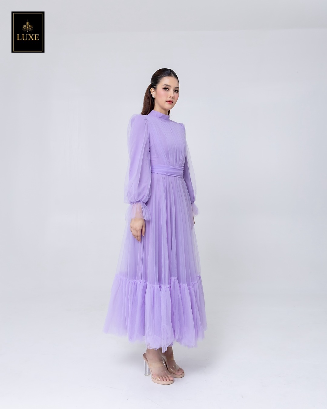 เดรสแฟชั่น แม็กซี่เดรสเสื้อคอปีนแขนยาว กระโปรงบานต่อชายรูดระบายรอบตัว มีโบว์ผูกเอว