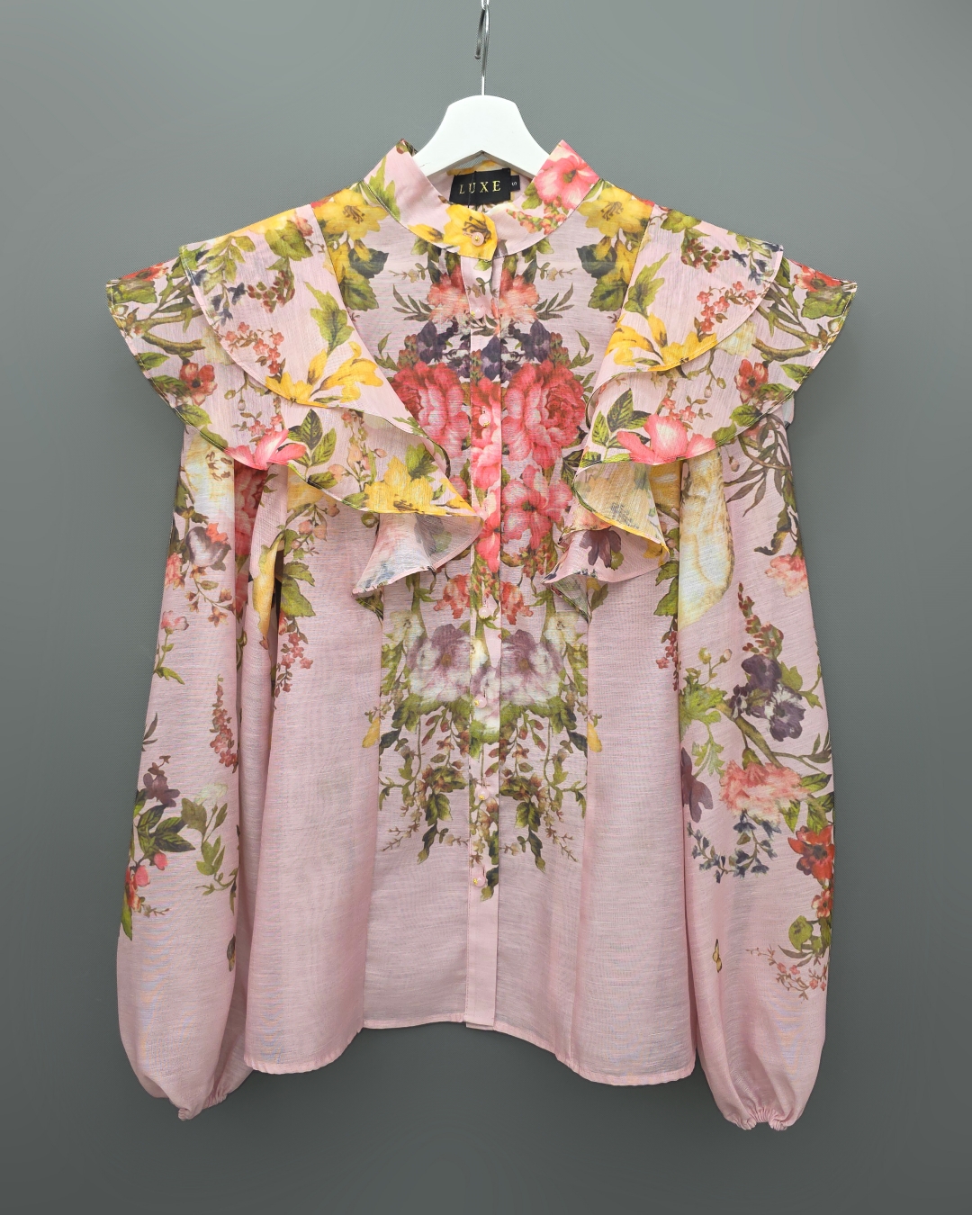 ชุดเซทแฟชั่น เซ็ตเสื้อคอกลมแขนยาว+กระโปรงยาว แต่งระบายตัวเสื้อหน้าและหลัง