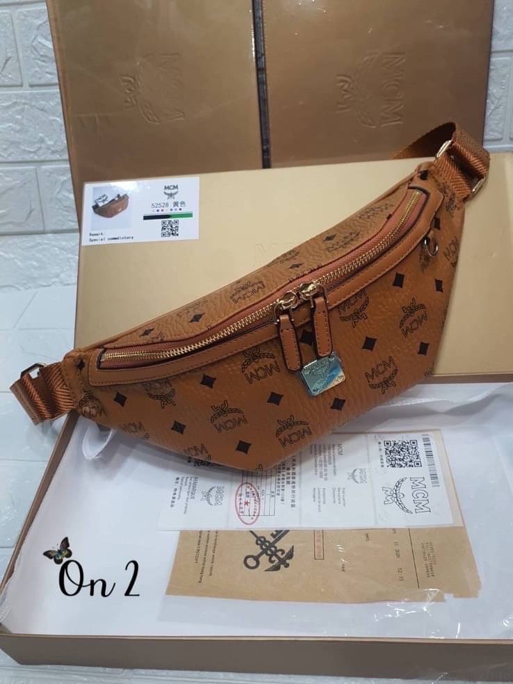 Mcm bag กระเป๋าคาดอกคาดเอวงานแบรนด์ ลาย โมโนแกรม หนังสวยงานดีงานเป๊ะมากค่ะ ผู้หญิงสะพายได้ ผู้ชายสะพายดี ห้ามพลาดน้า