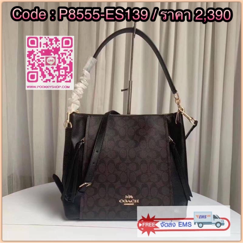 Coach MARLON HOBO IN SIGNATURE CANVAS Signature coated canvas and refined pebble leather| Inside zip pocket| Zip-top closure, fabric lining| Handle with 9" drop| Outside zip pockets| Detachable strap with 20" drop for shoulder or crossbody wear