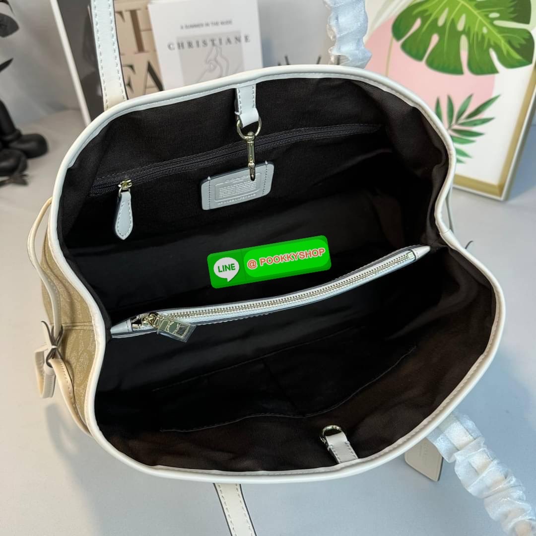 กระเป๋าสะพายไหล่ CCOACH DRAWSTRING CARRYALL IN SIGNATURE COATED CANVAS ( COACH F57842 ) กระเป๋าถือหนังเคลือบลายเซ็น ด้านในมีซิป ใส่โทรศัพท์ และมัลติฟังก์ชั่น กระเป๋า ช่องซิปกลาง Dogleash คลิปปิด ซับในผ้า