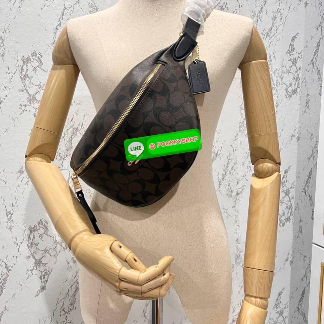 COACH F48740 BELT BAG IN SIGNATURE CANVAS กระเป๋าคาดอกทรง Unisex ทรงโดมรุ่นยอดฮิตไม่มีตกเทรน สวยเท่ทุกสี วัสดุหนังแคนวาสเคลือบคุณภาพดีตัดหนังแท้ ทนทาน ใช้งานง่าย ภายในเป็นช่องโล่ง ใส่ของได้เยอะ หยิบจับได้สะดวก ใช้ได้ทั้งชายและหญิง ใบจริงสวยไม่ผิดหวังคะ