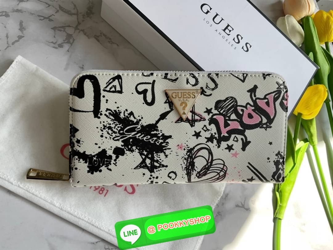 GUESS ABREE PRINTED ZIP-AROUND WALLET กระเป๋าสตางค์ใบยาวหนังซาเฟียโน่พิมพ์ลายดอกสวยหรู ด้านหน้าประดับโลโก้แบรนด์ เปิดปิดด้วยซิป ภายในแบ่งเป็น 3 ช่องหลักใส่ธนบัตรได้ มีช่องซิป 1 ช่อง ช่องใส่บัตร 8 ช่อง และมีช่องด้านหลังใส่บัตรสามารถใสธนบัตรได้อีกด้วย สามาร