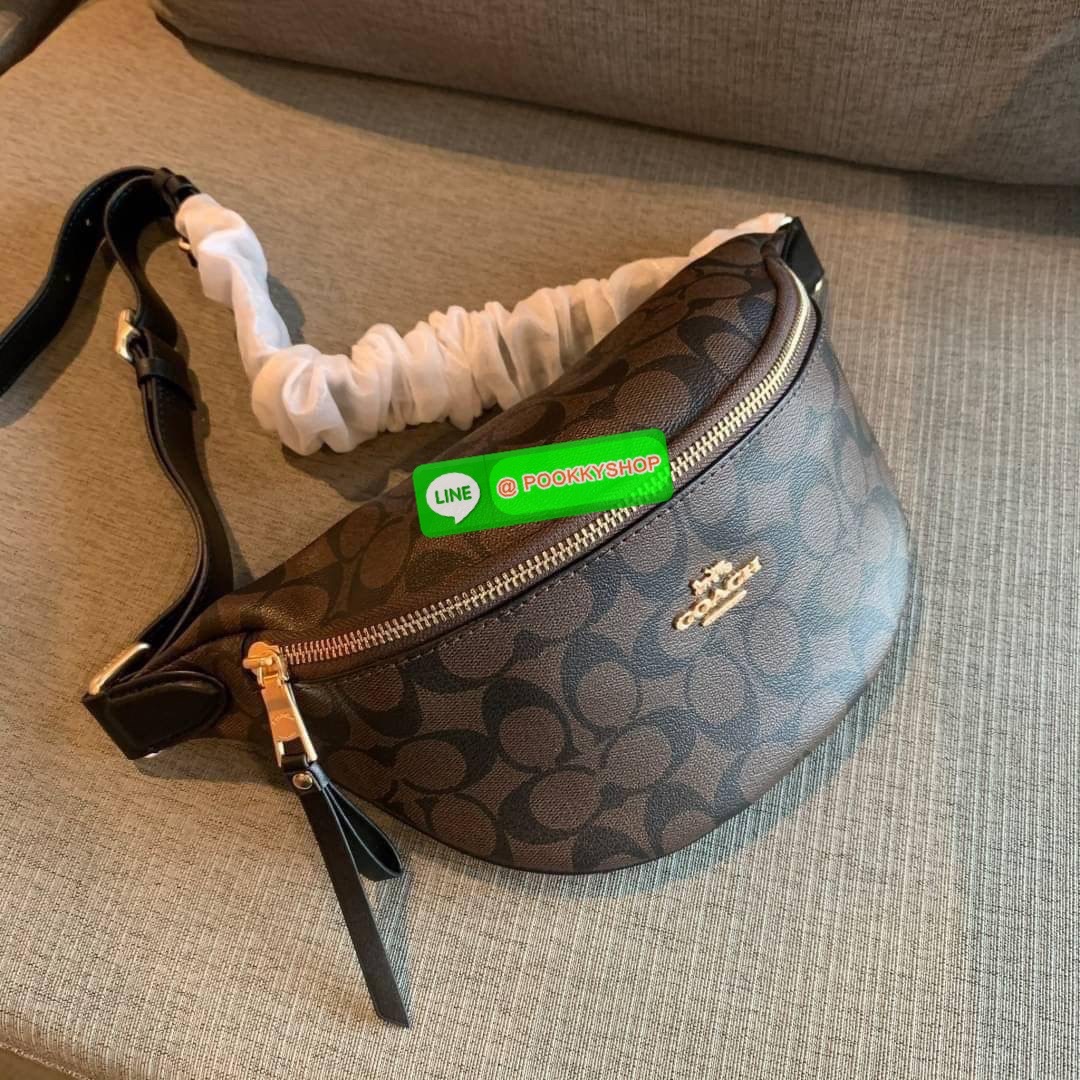 COACH F48740 BELT BAG IN SIGNATURE CANVAS กระเป๋าคาดอกทรง Unisex ทรงโดมรุ่นยอดฮิตไม่มีตกเทรน สวยเท่ทุกสี วัสดุหนังแคนวาสเคลือบคุณภาพดีตัดหนังแท้ ทนทาน ใช้งานง่าย ภายในเป็นช่องโล่ง ใส่ของได้เยอะ หยิบจับได้สะดวก ใช้ได้ทั้งชายและหญิง ใบจริงสวยไม่ผิดหวังคะ