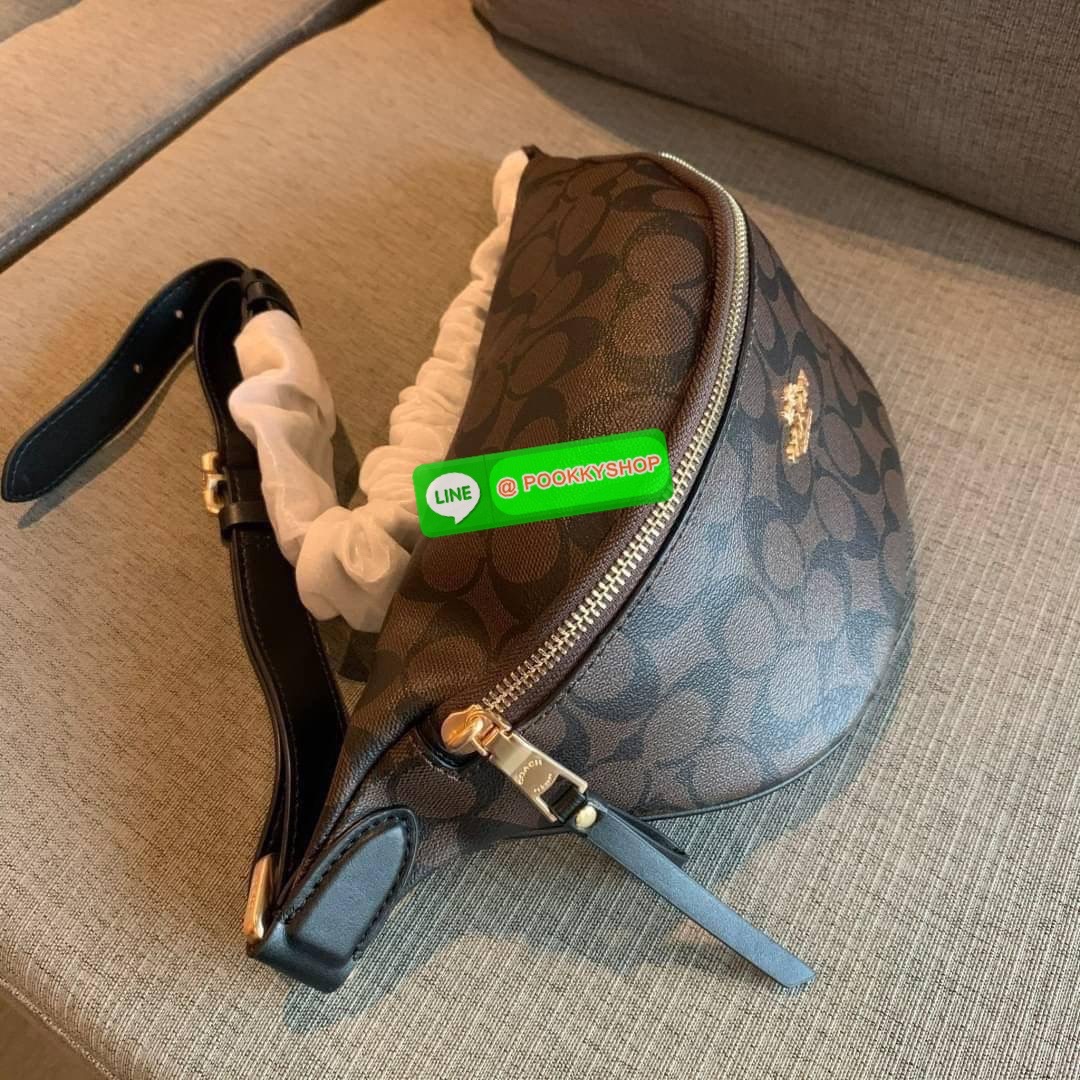 COACH F48740 BELT BAG IN SIGNATURE CANVAS กระเป๋าคาดอกทรง Unisex ทรงโดมรุ่นยอดฮิตไม่มีตกเทรน สวยเท่ทุกสี วัสดุหนังแคนวาสเคลือบคุณภาพดีตัดหนังแท้ ทนทาน ใช้งานง่าย ภายในเป็นช่องโล่ง ใส่ของได้เยอะ หยิบจับได้สะดวก ใช้ได้ทั้งชายและหญิง ใบจริงสวยไม่ผิดหวังคะ