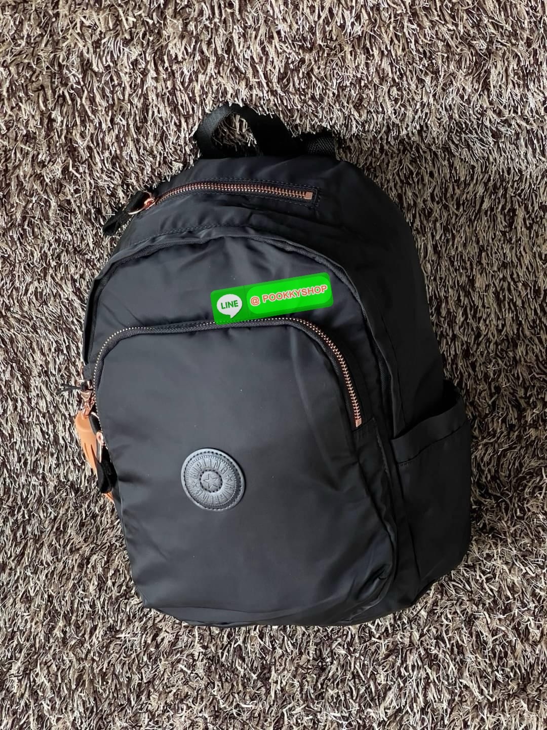 KIPLING Delia Medium Backpack with Front Pocket and top handle คอลเลคชั่นใหม่ล่าสุดจาก Paka Premium เป้ไซส์ขนาดกลางกำลังดีที่สามารถสะพายใช้งานได้ทุกวัน วัสดุ Polyester100% อะไหล่สีRose goldทั้งหมดรวมถึงเจ้าพวงกุญแจmonkeyและพู่หนังrubber เพิ่มความหรูหรา คอ