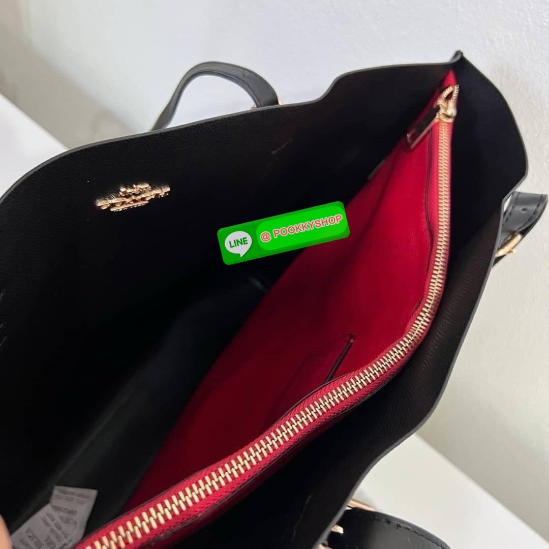 Coach MOLLIE TOTE IN SIGNATURE CANVAS (COACH 1665) กระเป๋าหนังใบเคลือบซิกเนเจอร์และหนังเรียบ ภายในกระเป๋ามัลติฟังก์ชั่น ปิดด้วยซิป ซับในผ้า หูหิ้วพร้อมหูหิ้ว 10 1/4" ช่องเปิดด้านข้าง