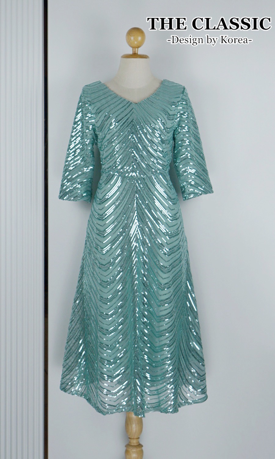 เดรสแฟชั่น ชุดเดรสออกงานปักเลื่อมใช้ผ้าเนื้อดีปักด้วยเลื่อมสีเงิน