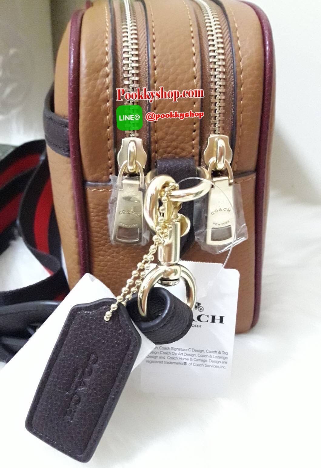 JES CROSSBODY IN COLORBLOCK (COACH F72704) LIGHT SADDLE/GOLD Refined pebble leather| Inside multifunction pocket| Double zip closure, fabric lining| Outside slip pocket| Detachable strap with 22" drop for shoulder or crossbody wear