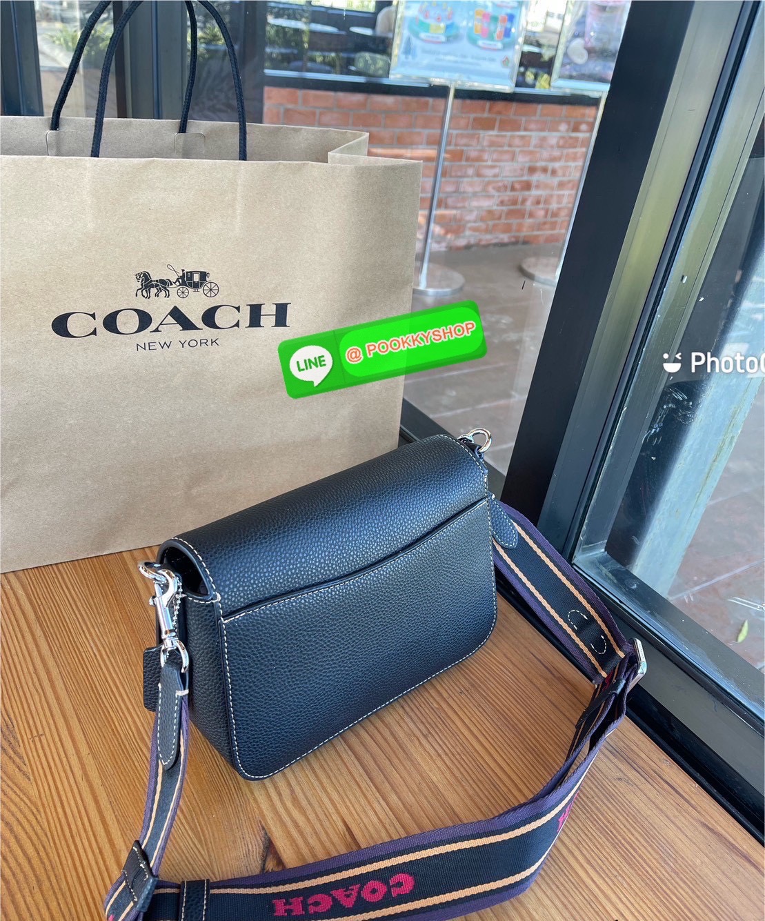 COACH CH483 – Camera Bag Strap Logo สุดจี๊ด รุ่นยอดนิยม โดดเด่นด้วยสายสะพายผ้าแถบโลโก้ COACH สีน้ำตาล -ดำ สะดุดตาไม่ซ้ำใคร! ดีไซน์ทรงกล่องกระทัดรัด ใส่มือถือ กระเป๋าสตางค์ และของใช้ประจำวันได้ครบ วัสดุ Signature coated canvas + หนังแท้ มาพร้อมฮาร์ดแวร์ทอง