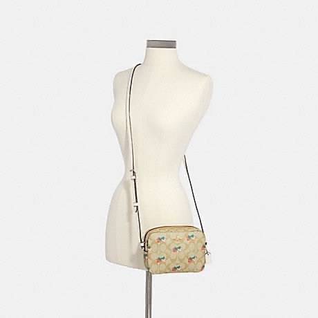 Coach MINI CAMERA BAG IN SIGNATURE CANVAS WITH STRAWBERRY PRINT IM/KHAKI MULTI Signature coated canvas with smooth leather details| Two credit card slots| Inside multifunction pocket| Zip closure, fabric lining| Outside open pocket| Adjustable strap with