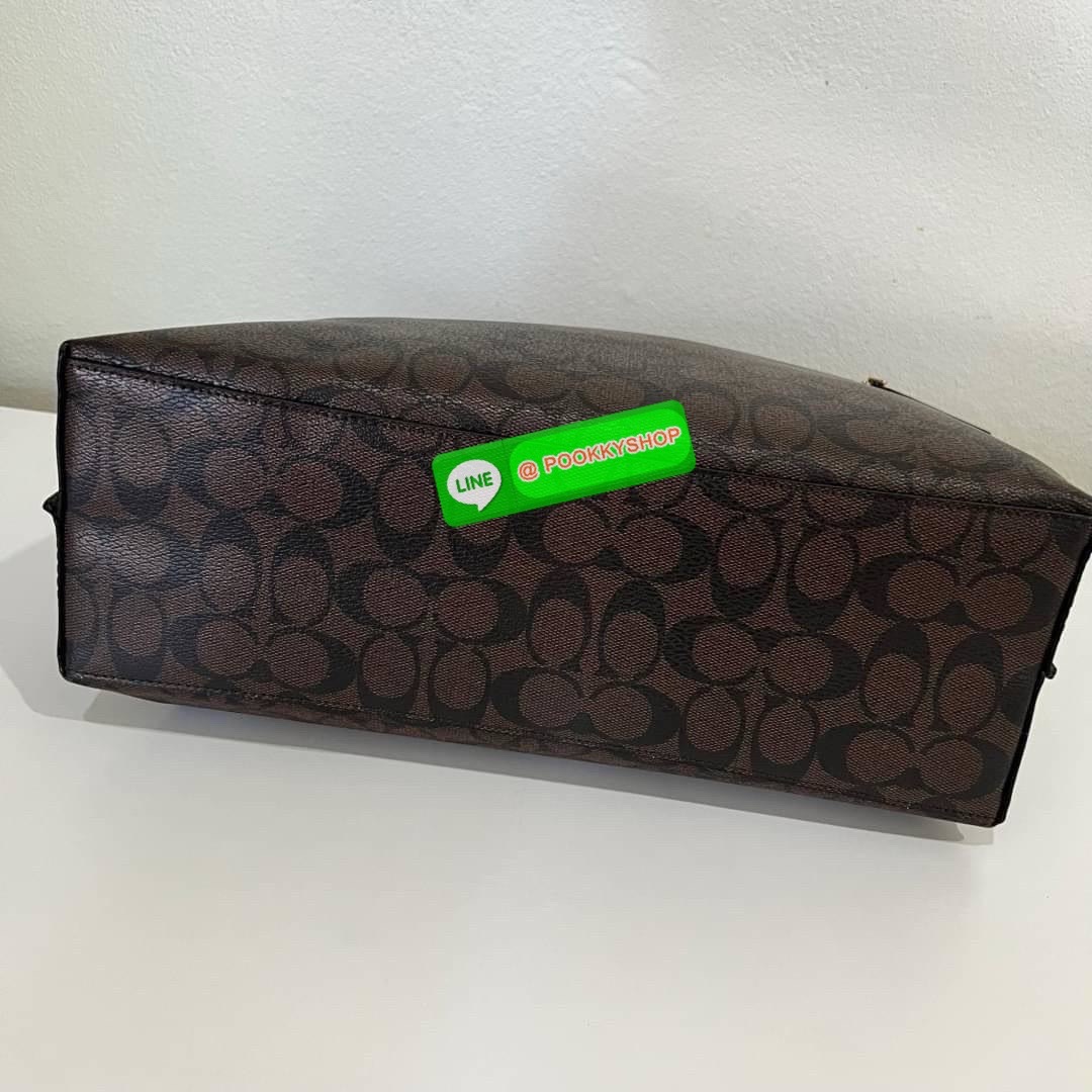 Coach MOLLIE TOTE IN SIGNATURE CANVAS (COACH 1665) กระเป๋าหนังใบเคลือบซิกเนเจอร์และหนังเรียบ ภายในกระเป๋ามัลติฟังก์ชั่น ปิดด้วยซิป ซับในผ้า หูหิ้วพร้อมหูหิ้ว 10 1/4" ช่องเปิดด้านข้าง